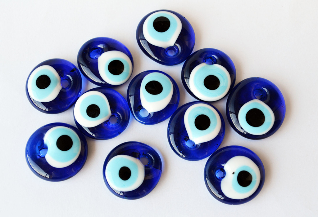 Что означает голубой глаз на браслете и значение амулета Око Фатимы